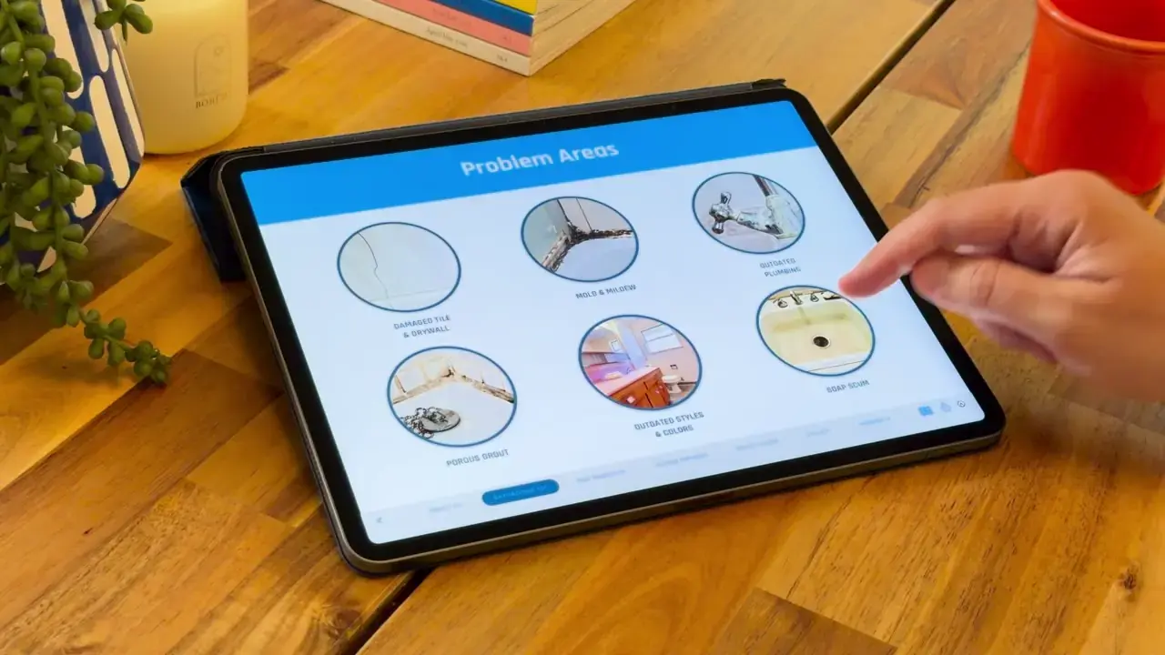 An Ingage bath presentation open on an iPad at a homeowner's kitchen table.