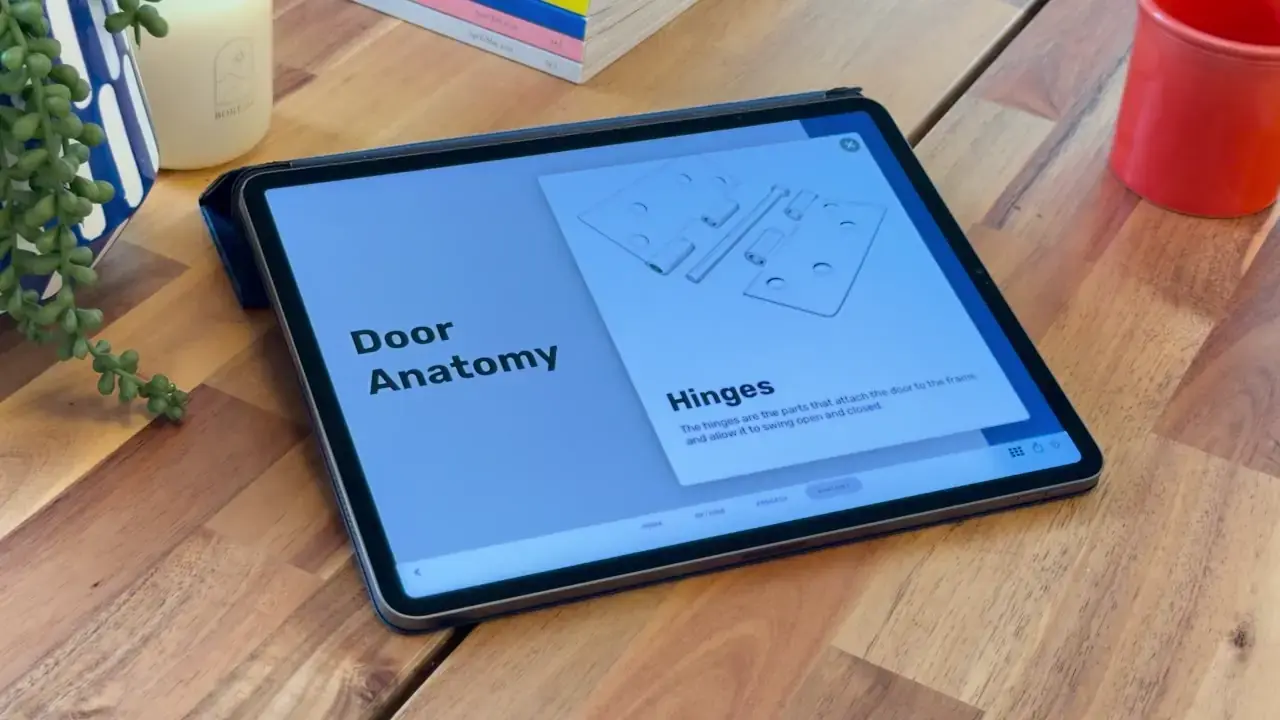 An Ingage doors presentation open on an iPad at a homeowner's kitchen table.
