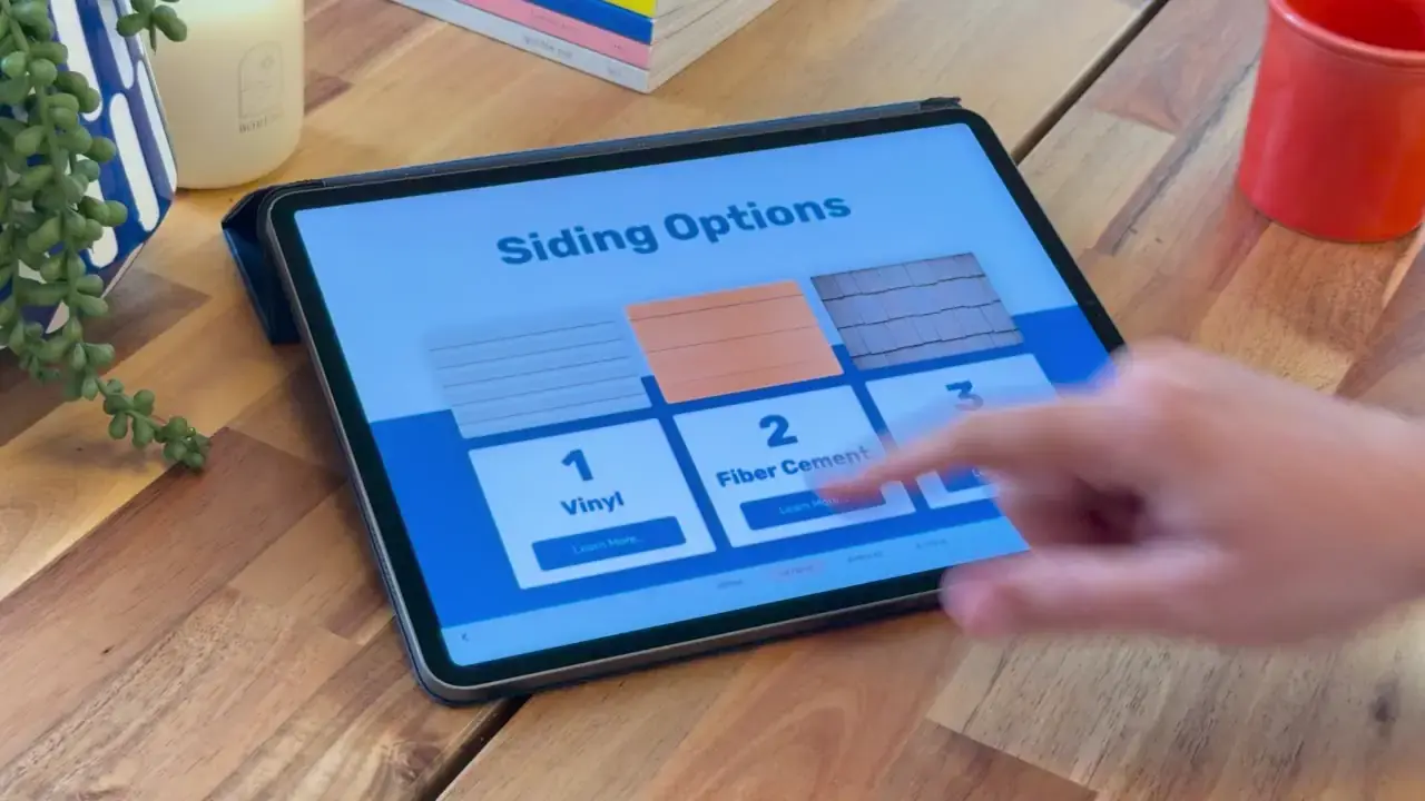 An Ingage siding presentation open on an iPad at a homeowner's kitchen table.