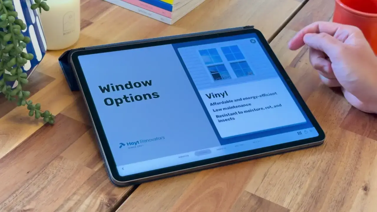 An Ingage windows presentation open on an iPad at a homeowner's kitchen table.